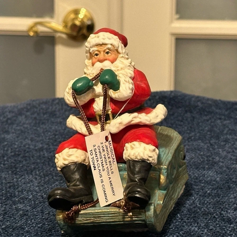 Musical vibrating Santa on his sleigh. Plays 3 songs!